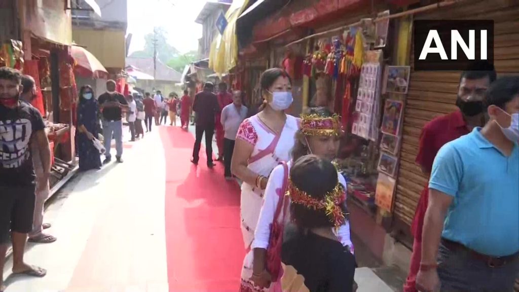 Devotees at the premises of Kamakhya Temple reopens | Image source: ANI